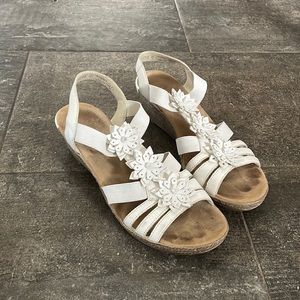 Rieker Womens White heals with flower design.